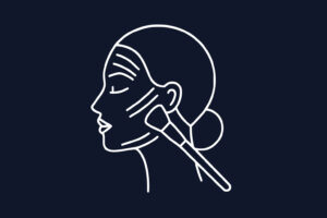 Line drawing of a woman's profile with a makeup brush applying product to her cheek on a dark background.