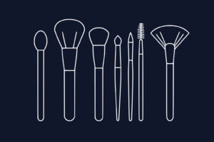 Line drawing of seven different makeup brushes and applicators on a dark background, each with distinct shapes and sizes.